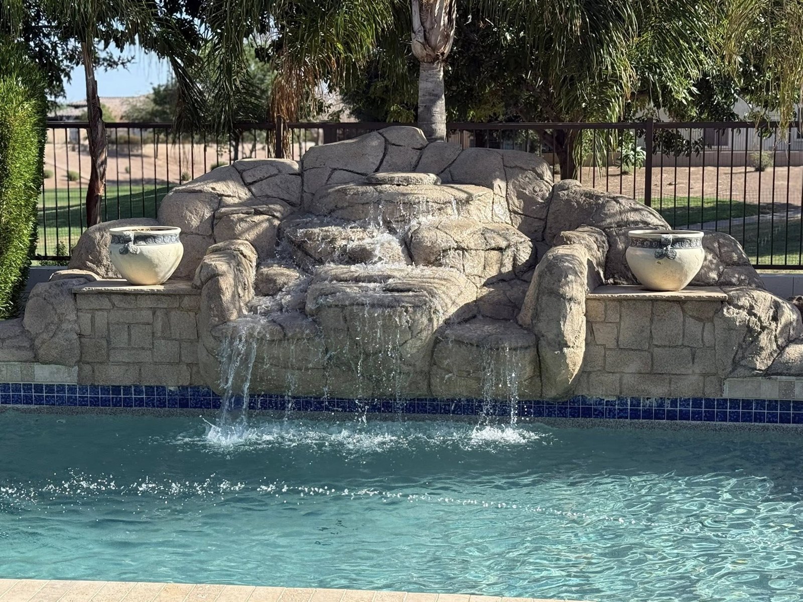 Rock waterfall built by Arizona Pool Service